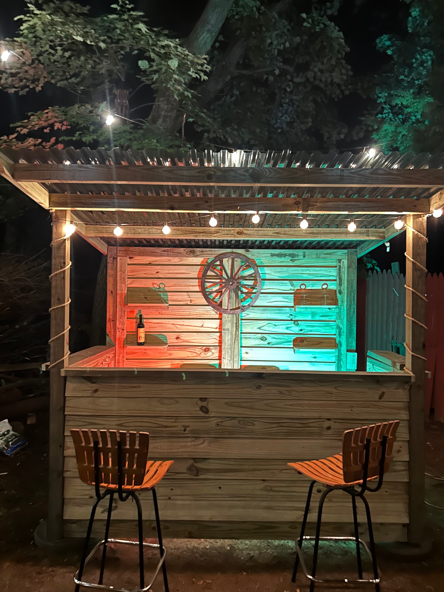 Premium pressure-treated wood backyard bar at golden hour